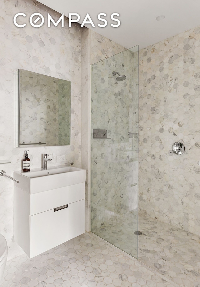 325 W Broadway Unit 7B, New York City, NY 10013 - full bath with a walk in shower, vanity, and tile patterned floors
