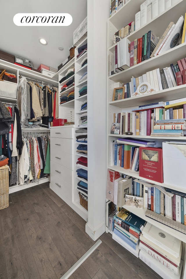 spacious closet featuring hardwood / wood-style floors