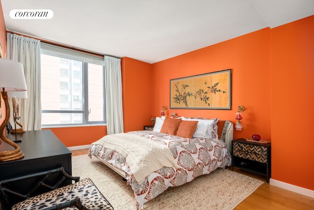 2 River Ter Unit 9C, New York City, NY 10282 - bedroom with wood finished floors and baseboards