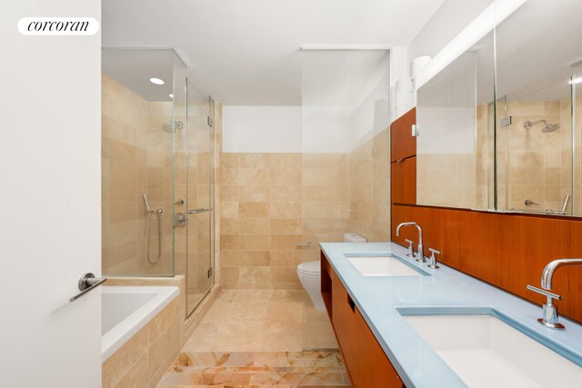 bedroom with visible vents, baseboards, and wood finished floors