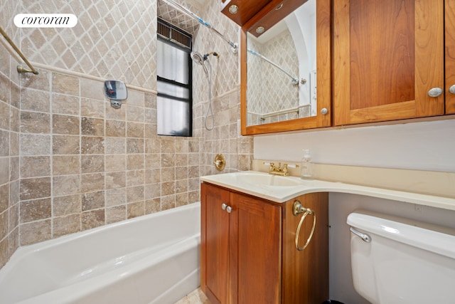 full bathroom with bathtub / shower combination, toilet, and vanity