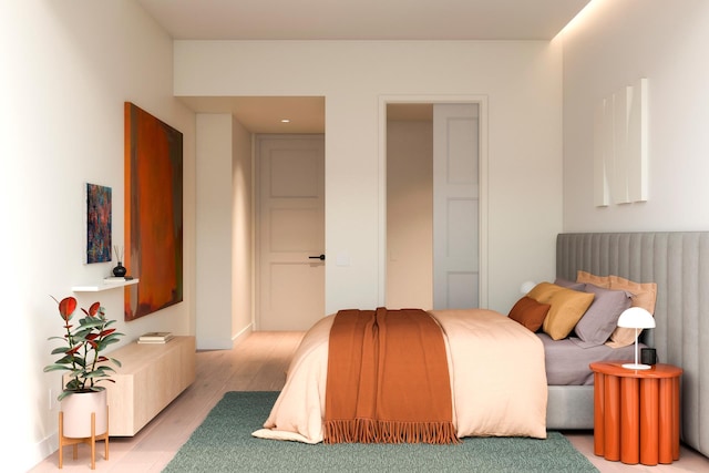 bedroom featuring light wood-style floors