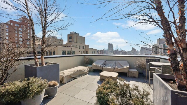 261 W 25th St Unit 1-C, New York City, NY 10001 - view of patio / terrace featuring a city view and area for grilling