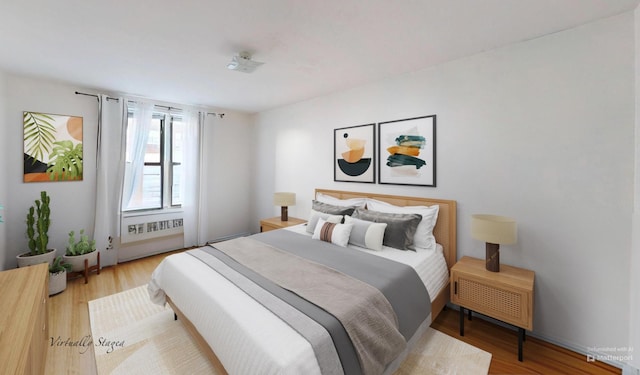 bedroom featuring wood finished floors