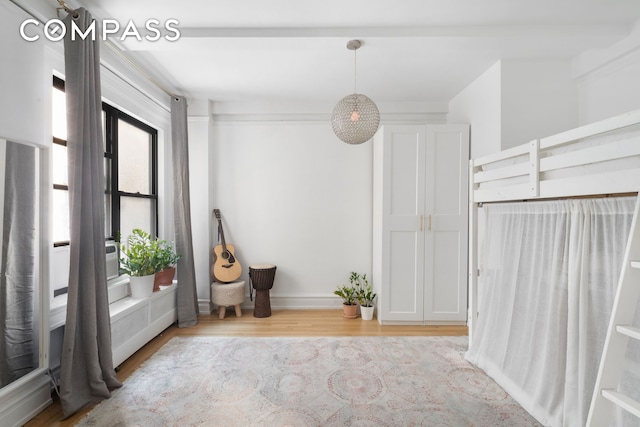 sitting room featuring wood finished floors