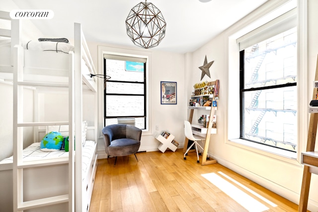 299 Riverside Dr Unit 3C, New York City, NY 10025 - living area featuring light wood finished floors, healthy amount of natural light, and baseboards