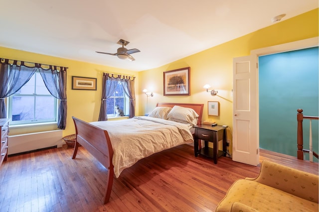 bedroom featuring hardwood / wood-style flooring and ceiling fan