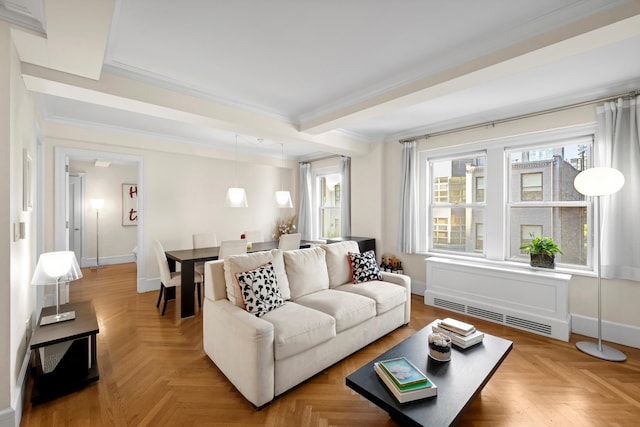 living area featuring radiator, baseboards, and ornamental molding