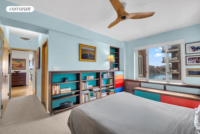 bedroom featuring ceiling fan, carpet, and visible vents