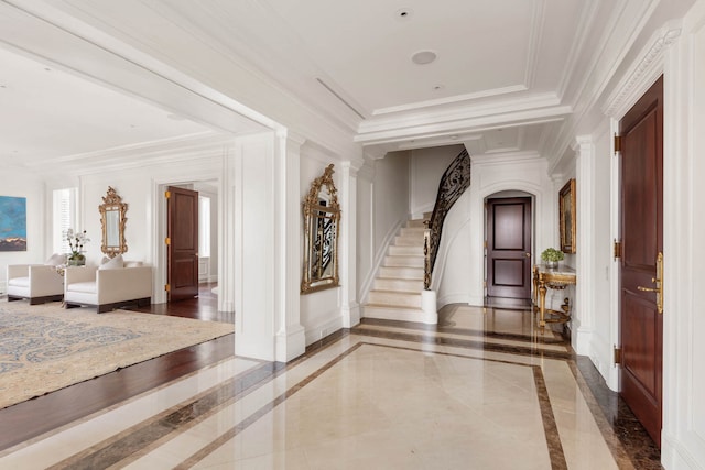 895 Park Ave Unit 16/17/18A, New York City, NY 10075 - interior space featuring decorative columns, crown molding, baseboards, and stairway
