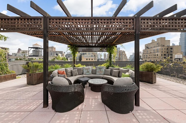 view of patio with a view of city, an outdoor living space, and a pergola