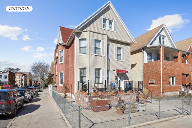 901 Newkirk Ave, New York City, NY 11230 - view of front of home featuring brick siding and a fenced front yard