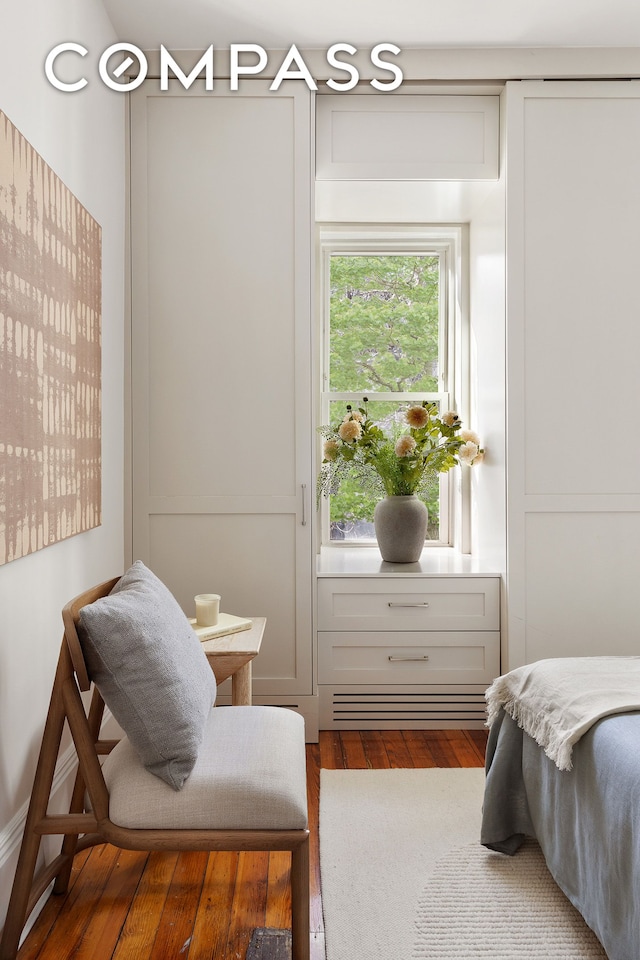 bedroom featuring wood finished floors