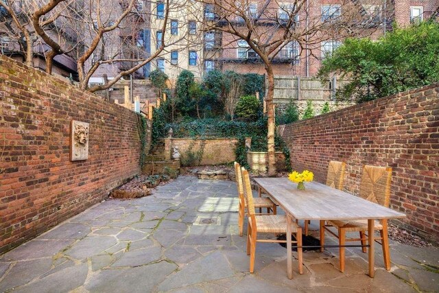 view of patio / terrace with fence and outdoor dining area