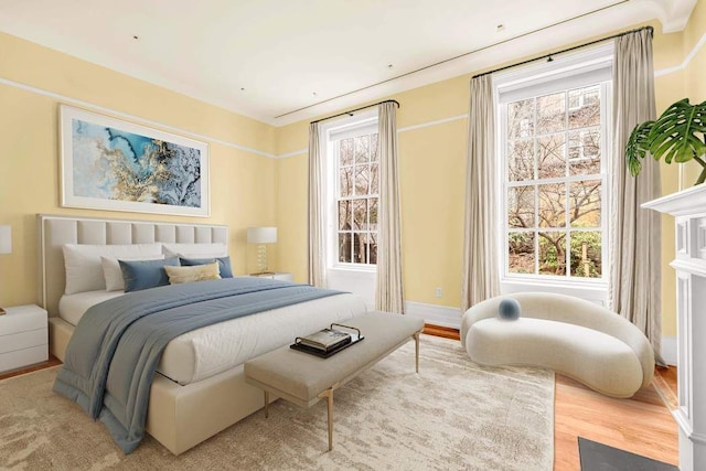 bedroom with wood finished floors
