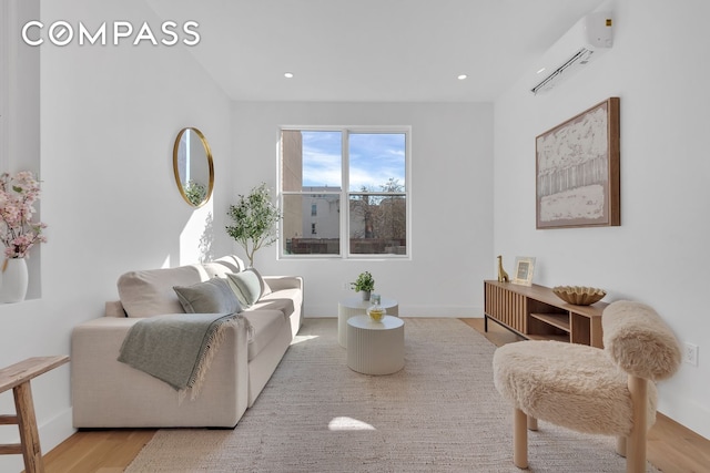 97 Seigel St Unit 3A, New York City, NY 11206 - living room featuring a wall unit AC, wood finished floors, and recessed lighting