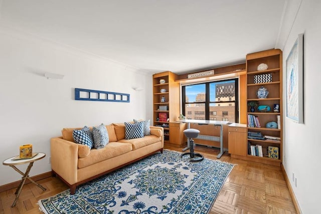 living area featuring baseboards