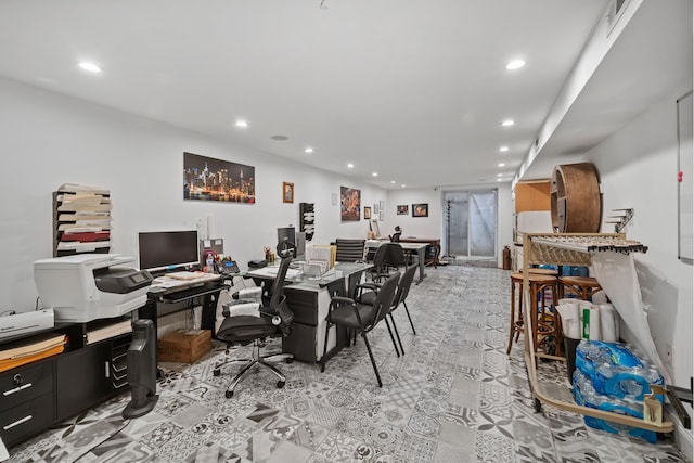 dining room featuring recessed lighting
