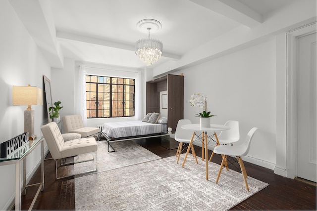 bedroom with a chandelier, beamed ceiling, wood finished floors, and baseboards