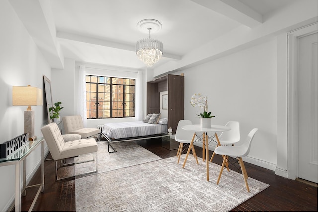 25 Tudor City Pl Unit 1316, New York City, NY 10017 - bedroom featuring wood finished floors and a notable chandelier