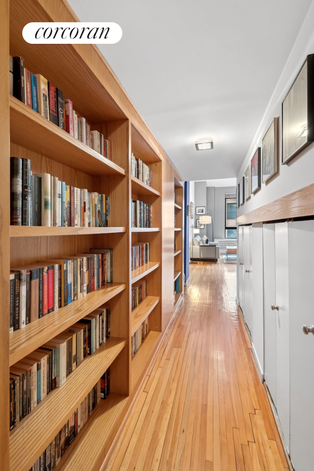 hallway featuring light wood finished floors