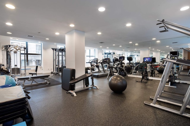 gym featuring recessed lighting