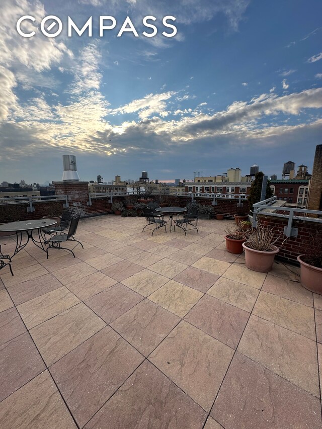 view of patio featuring a view of city