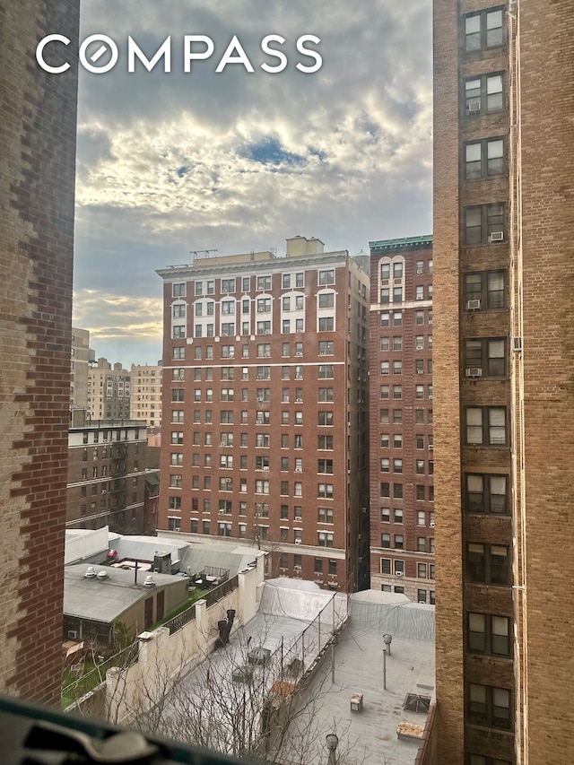 view of building exterior with a view of city