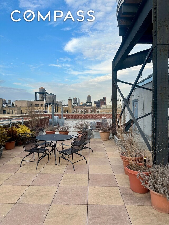 view of patio featuring a view of city