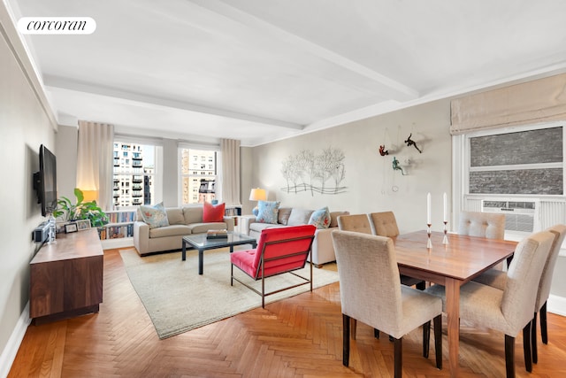 dining space featuring baseboards, cooling unit, visible vents, and beam ceiling