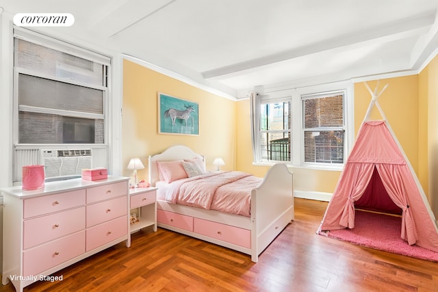 bedroom with beam ceiling, visible vents, wood finished floors, cooling unit, and baseboards