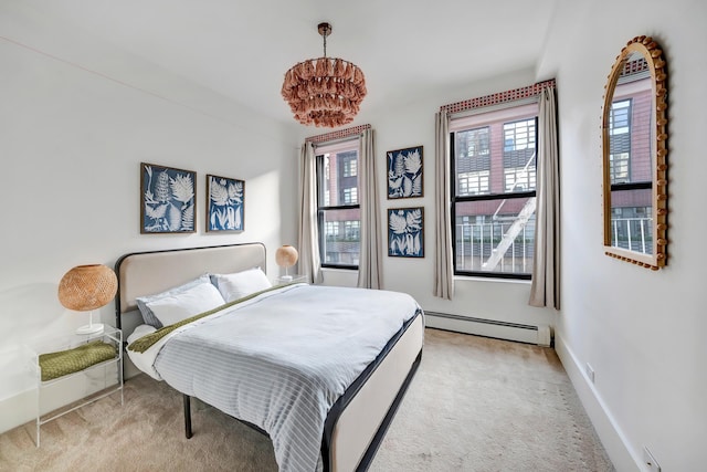 bedroom featuring baseboards, light colored carpet, and baseboard heating