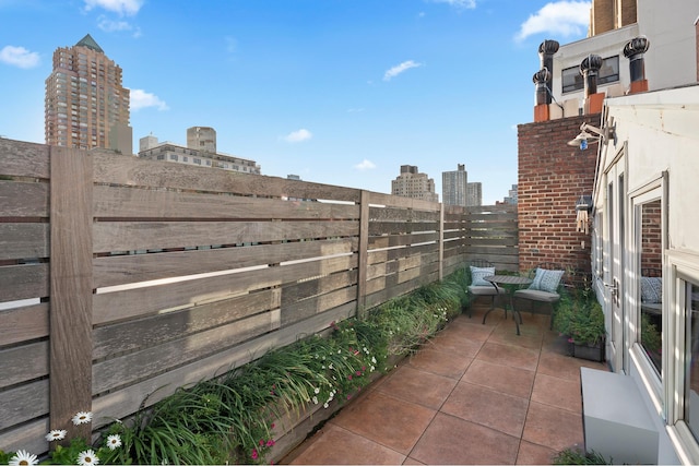 balcony featuring a view of city