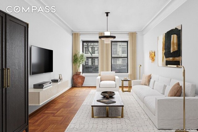 living room with baseboards and ornamental molding