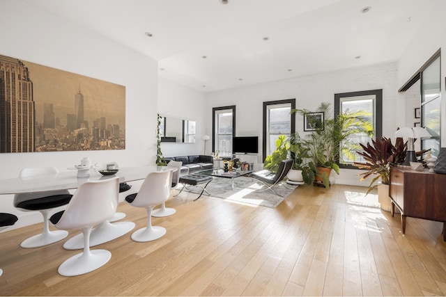 living room featuring hardwood / wood-style flooring and recessed lighting