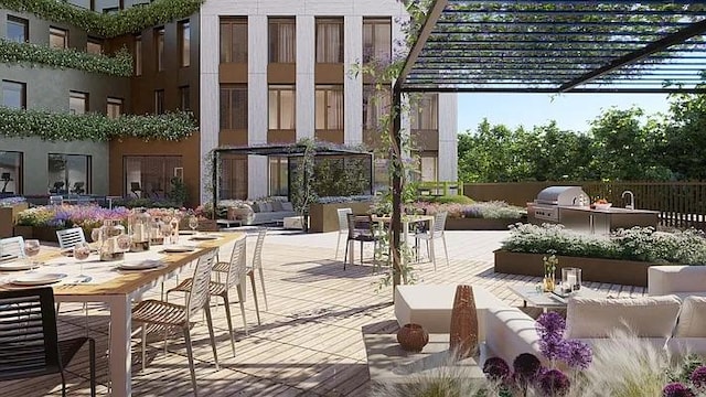 view of patio featuring outdoor lounge area, grilling area, an outdoor kitchen, and a pergola