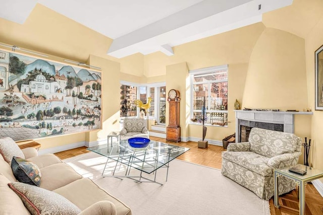 19 E 88th St Unit 15G, New York City, NY 10128 - living area with a tiled fireplace and baseboards