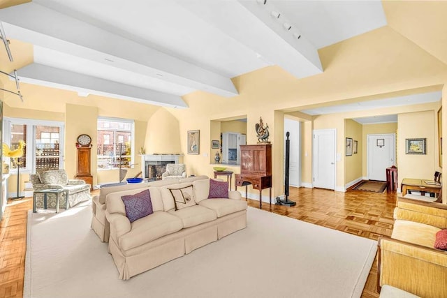 19 E 88th St Unit 15G, New York City, NY 10128 - living area with a fireplace and baseboards