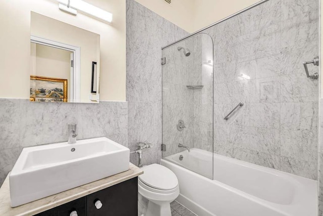 19 E 88th St Unit 15G, New York City, NY 10128 - full bath with toilet, vanity, shower / washtub combination, and tile walls