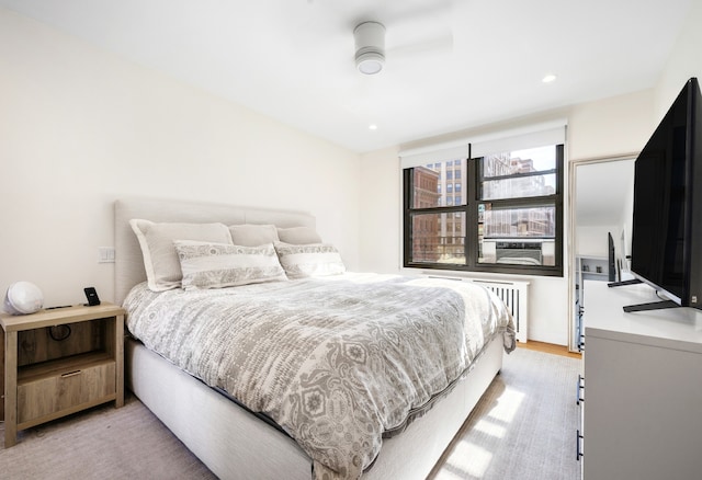 bedroom featuring radiator heating unit