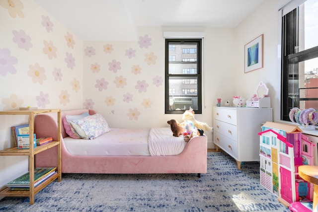 bedroom featuring wallpapered walls