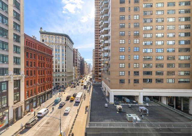 view of building exterior featuring a view of city