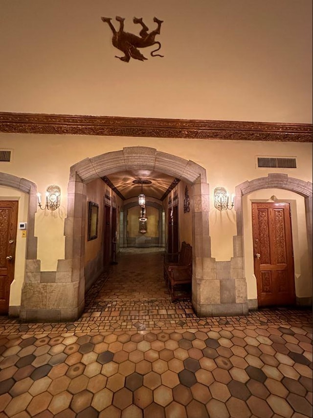 25 Tudor City Pl Unit 2119, New York City, NY 10017 - corridor featuring arched walkways
