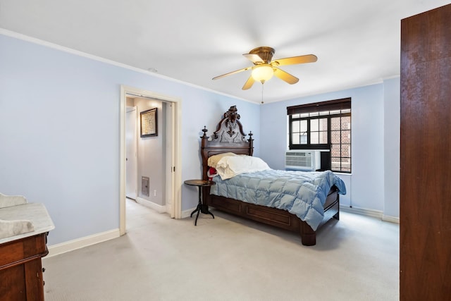 bedroom with baseboards, light carpet, a ceiling fan, and crown molding