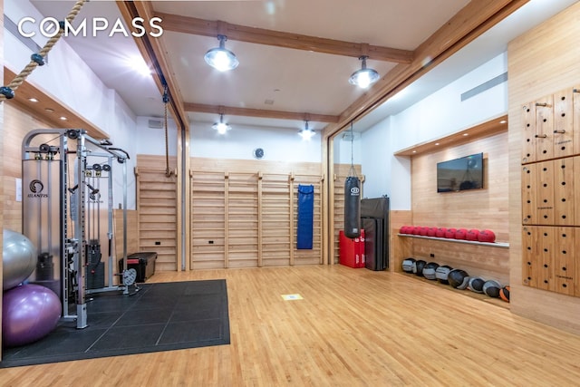 exercise area with wood finished floors