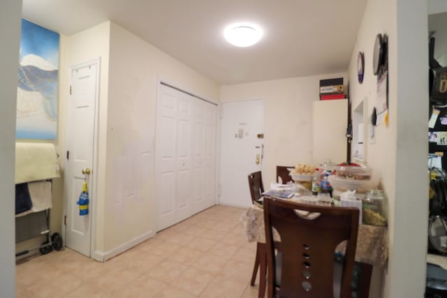 dining room featuring baseboards