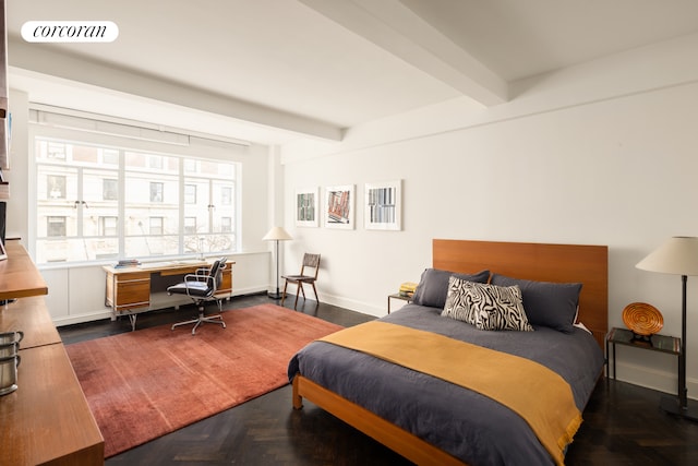 bedroom featuring beamed ceiling, visible vents, and baseboards