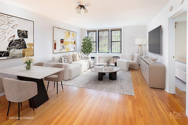 living area featuring light wood-style flooring