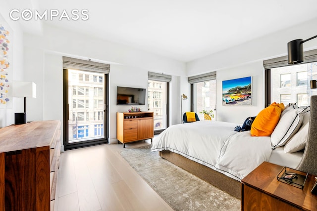 bedroom with wood finished floors