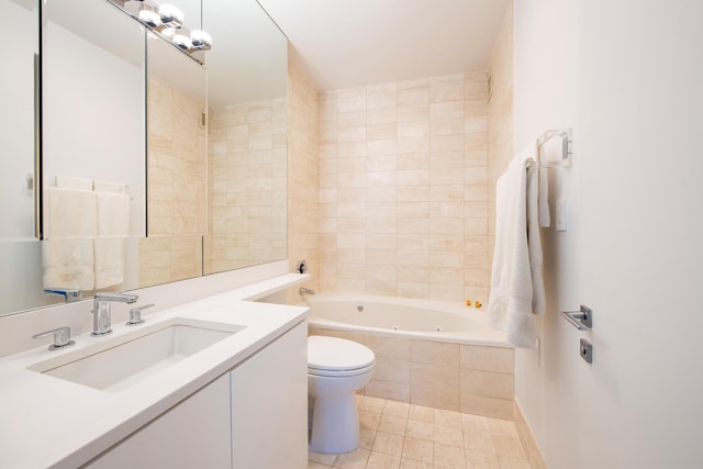 bathroom with a whirlpool tub, toilet, tile patterned flooring, and vanity